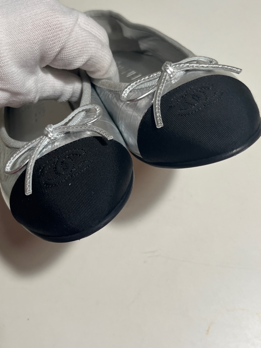 CHANEL Silver Metallic Leather Ballet Flats with Black Cap Toe - Picture 2 of 10